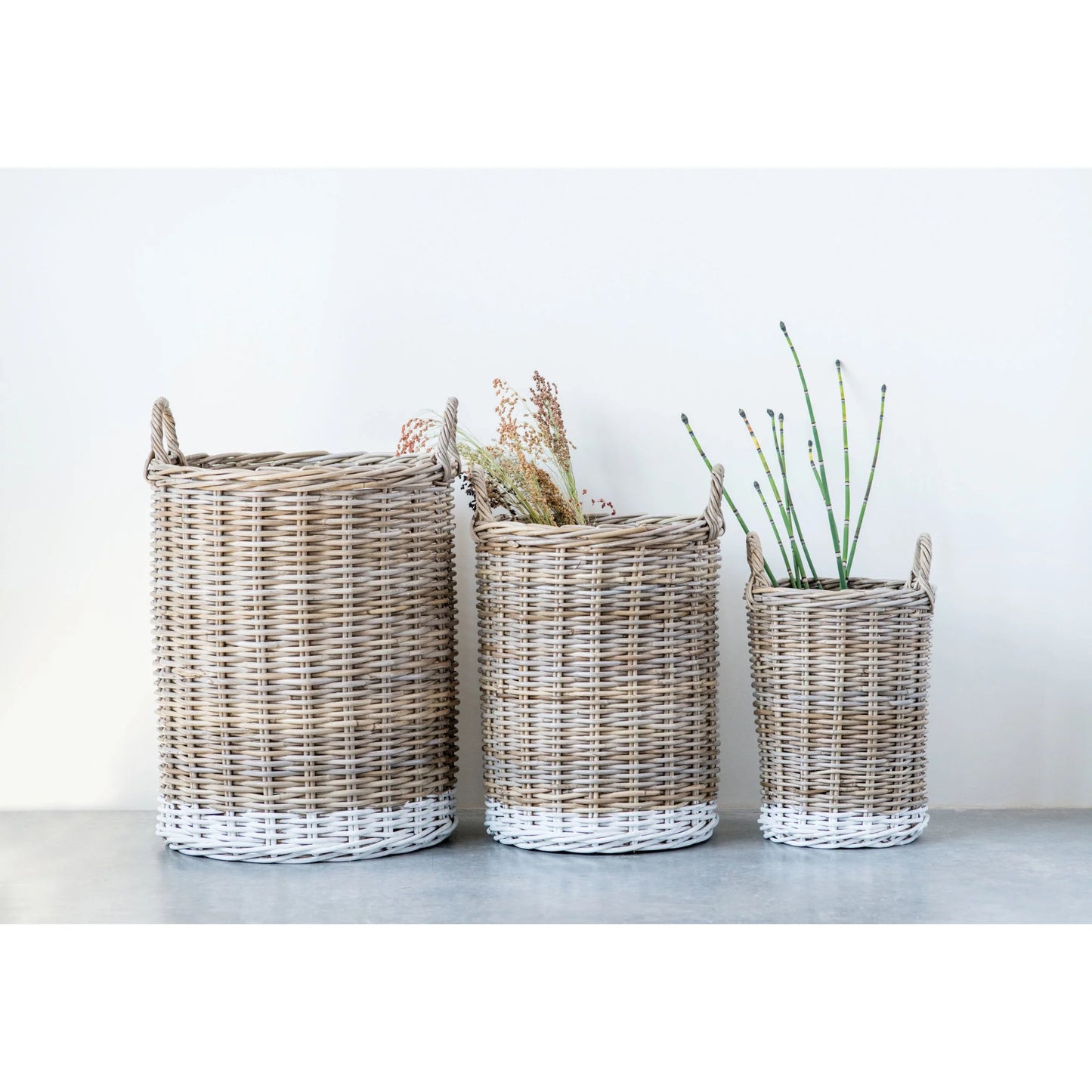 Coordinating set of Rattan baskets with handles. Natural in color and hand made artisan goods. Can be used for faux stem decor. Blanket storage. Kids toys storage. Home Decor.